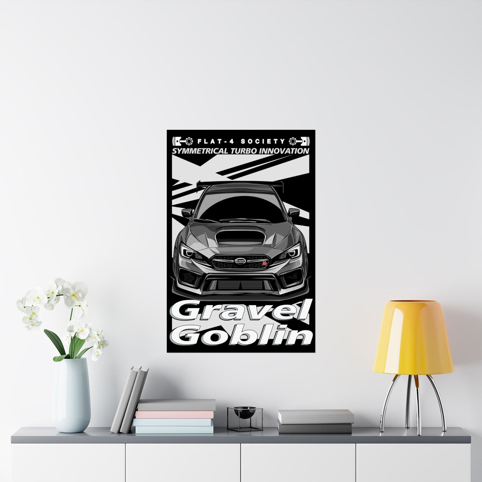 Gravel Goblin Matte Vertical Poster – Bold matte vertical poster displayed in a living room setting featuring a detailed Gravel Goblin rally car design with high-contrast graphics and sleek typography. Perfect for rally and Subaru enthusiasts.