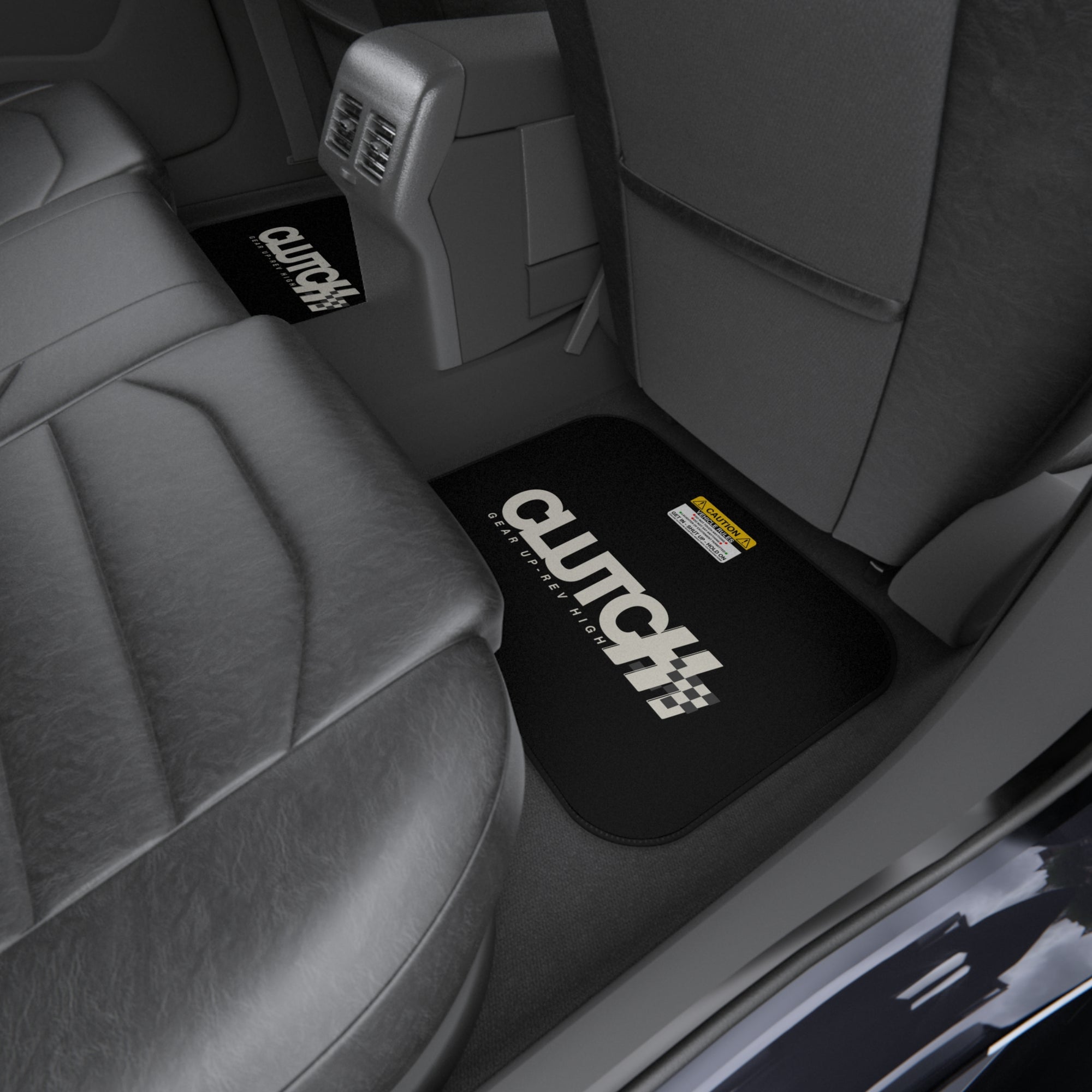 Clutch Car Mat Set – Right Rear Premium set of black car mats featuring the Clutch logo and "Gear Up, Rev High" tagline Displayed in the front seat of a car. Designed for durability and style, perfect for automotive enthusiasts.