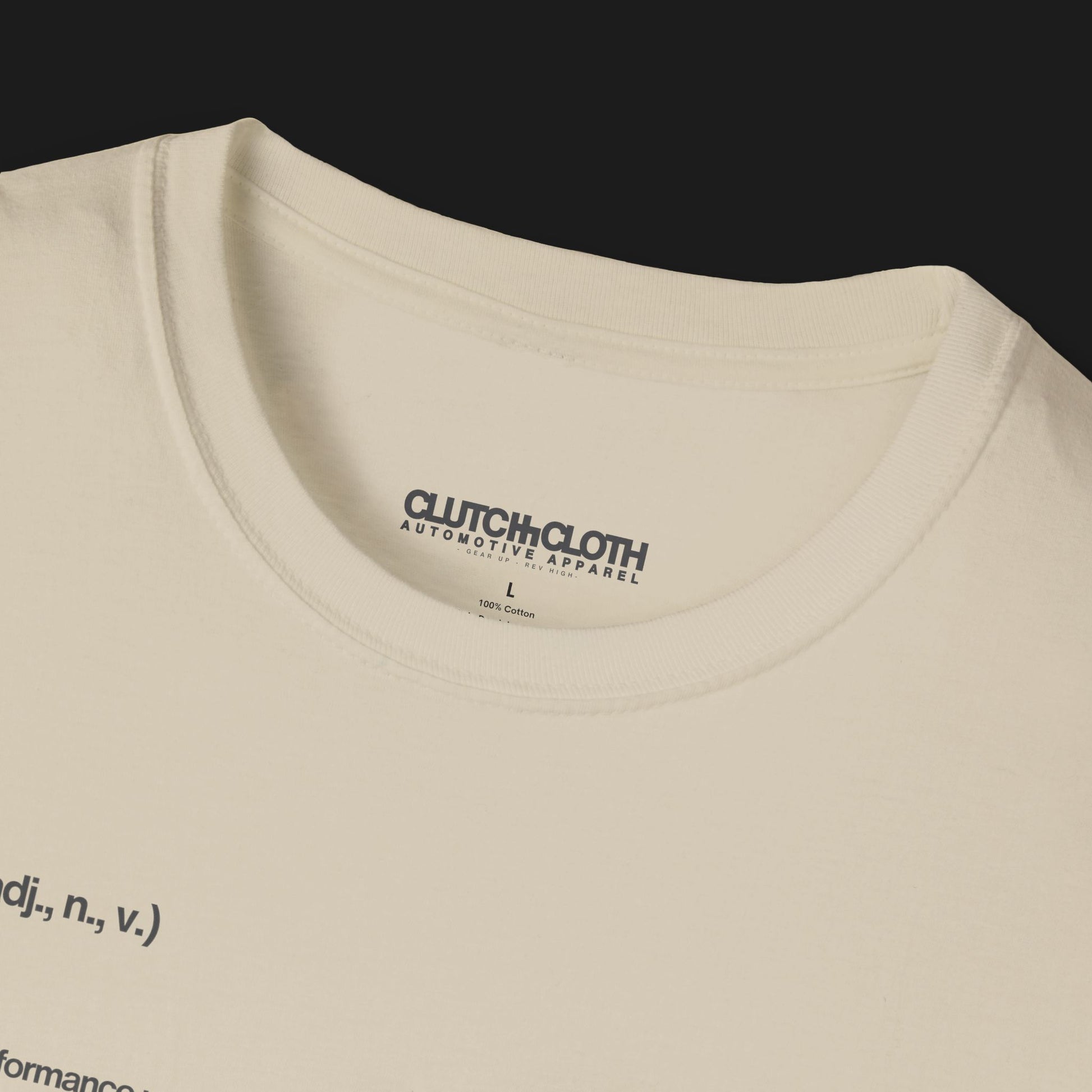 Collar of Define Clutch Automotive Graphic T-Shirt – Sand unisex tee featuring the definition of 'Clutch' in a minimalist text design. A perfect gift for car enthusiasts and motorsport fans.