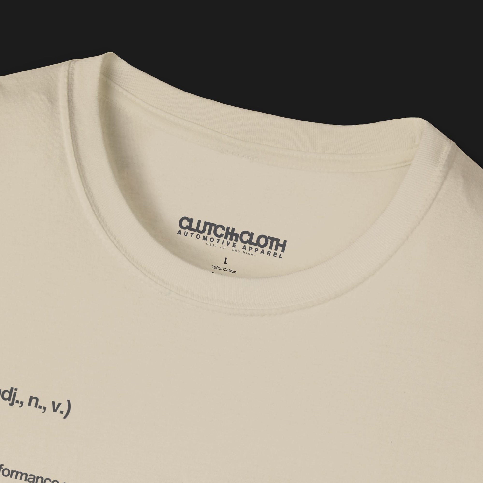 Collar of Define Clutch Automotive Graphic T-Shirt – Sand unisex tee featuring the definition of 'Clutch' in a minimalist text design. A perfect gift for car enthusiasts and motorsport fans.