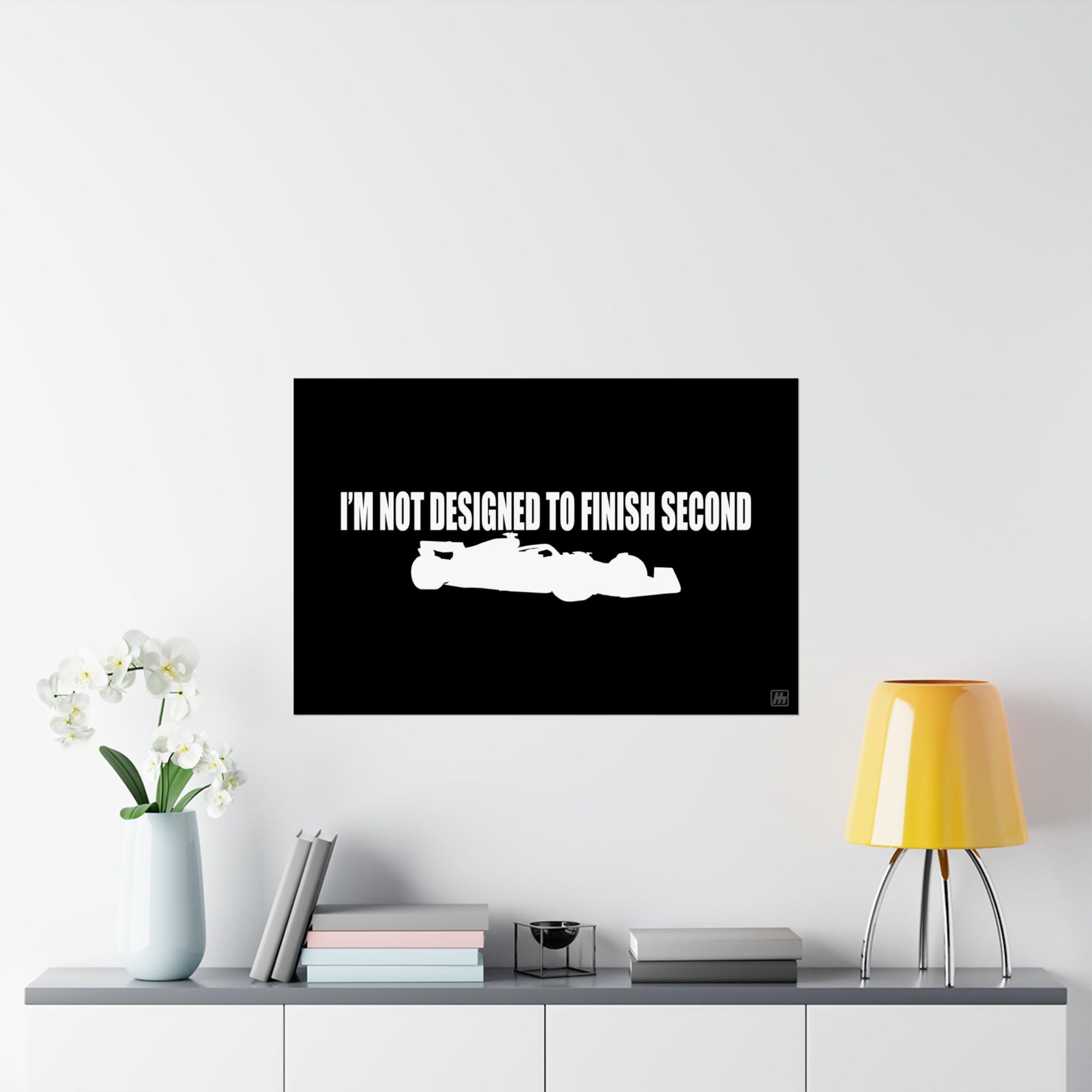 F1 - Not Designed To Finish Second Poster in a Living Room Setting – Bold black and white automotive poster featuring a Formula 1 silhouette and motivational quote. Perfect gift for racing fans and car enthusiasts.