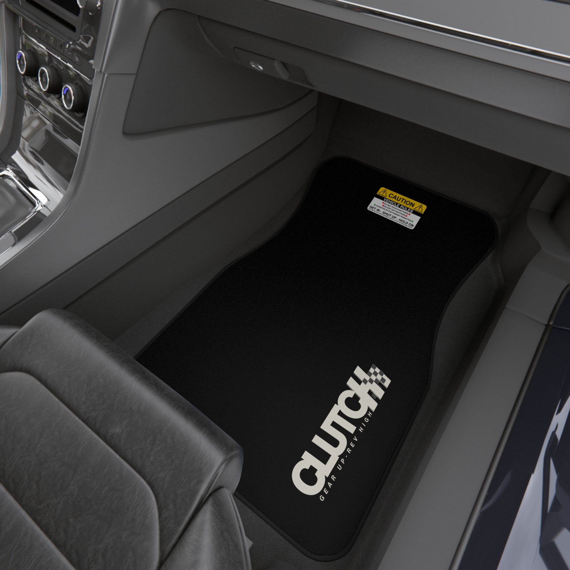 Clutch Car Mat Set – Front Right Premium set of black car mats featuring the Clutch logo and "Gear Up, Rev High" tagline Displayed in the front seat of a car. Designed for durability and style, perfect for automotive enthusiasts.