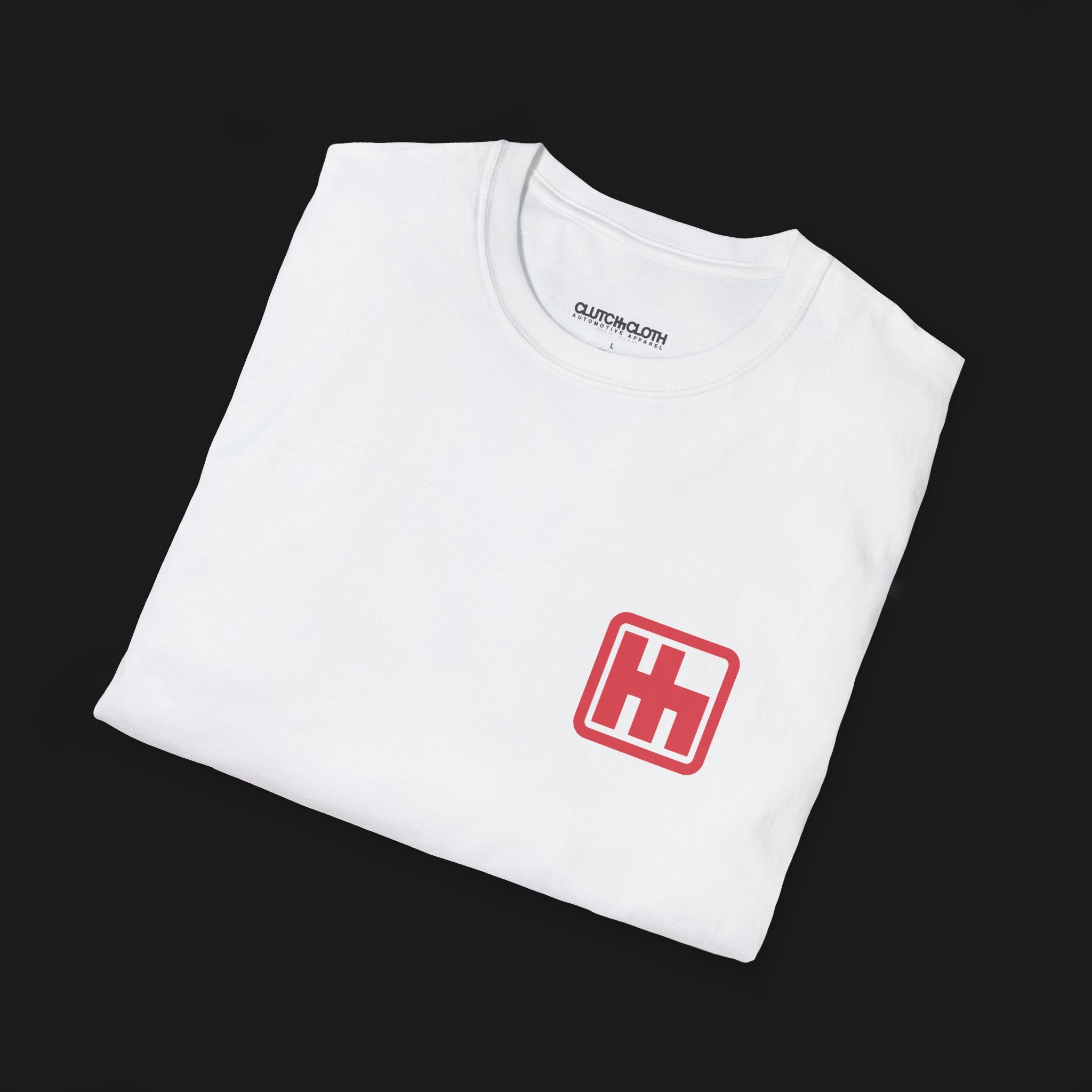 Folded Clutch Gated H Shifter Automotive Graphic T-Shirt – White unisex tee with a minimalist red 'H' shifter logo on the left chest. Ideal gift for car enthusiasts and motorsport lovers.
