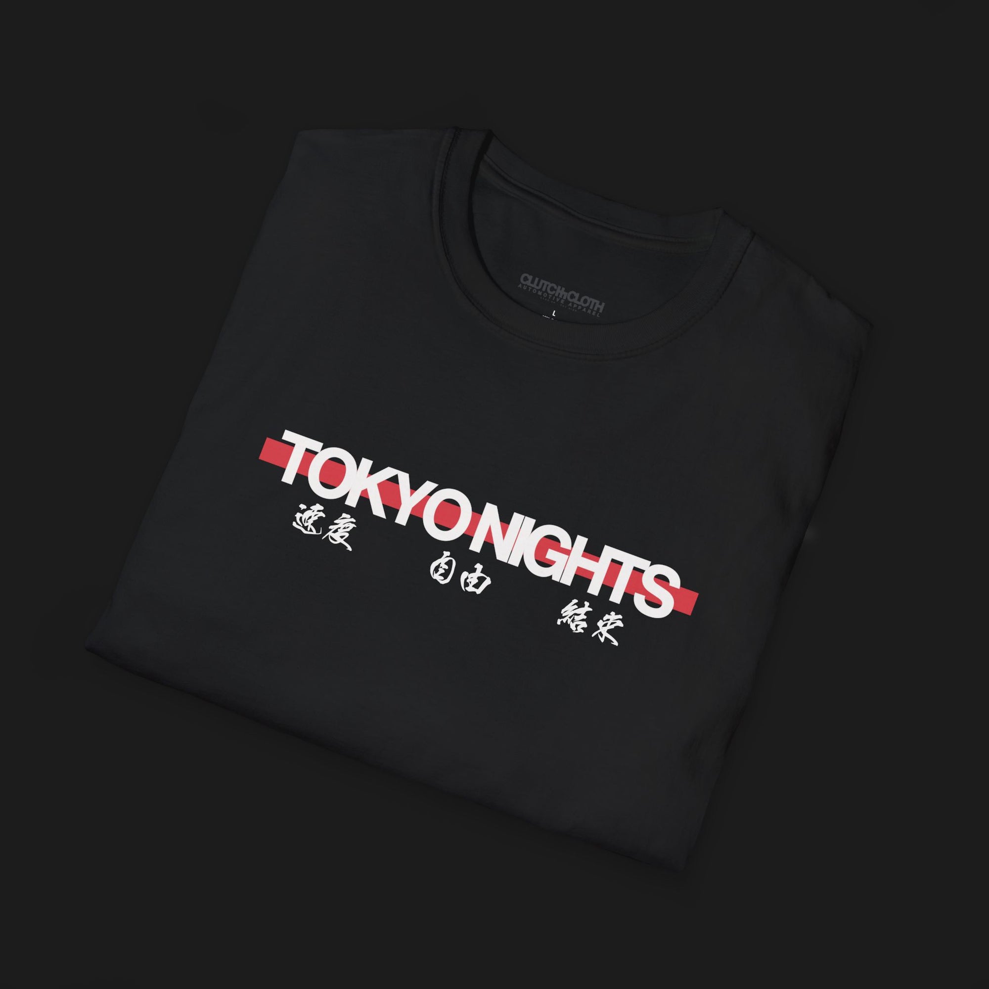 Folded Tokyo Nights Automotive Graphic T-Shirt – Black unisex tee featuring 'Tokyo Nights' in white and red with Japanese characters representing speed, freedom, and unity. Ideal gift for JDM fans and street racing enthusiasts.
