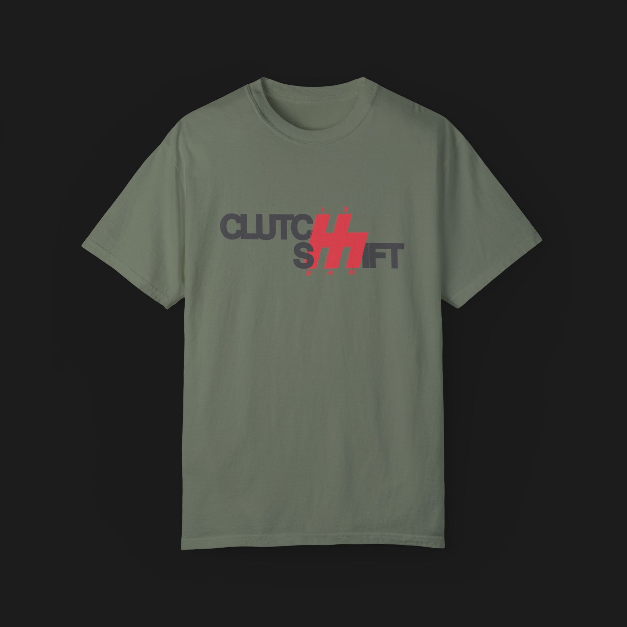 Front Angle of Clutch Shift Automotive Graphic T-Shirt – Green tee with "Clutch Shift" text and red gear shift design. Perfect gift for car enthusiasts and motorsport fans.
