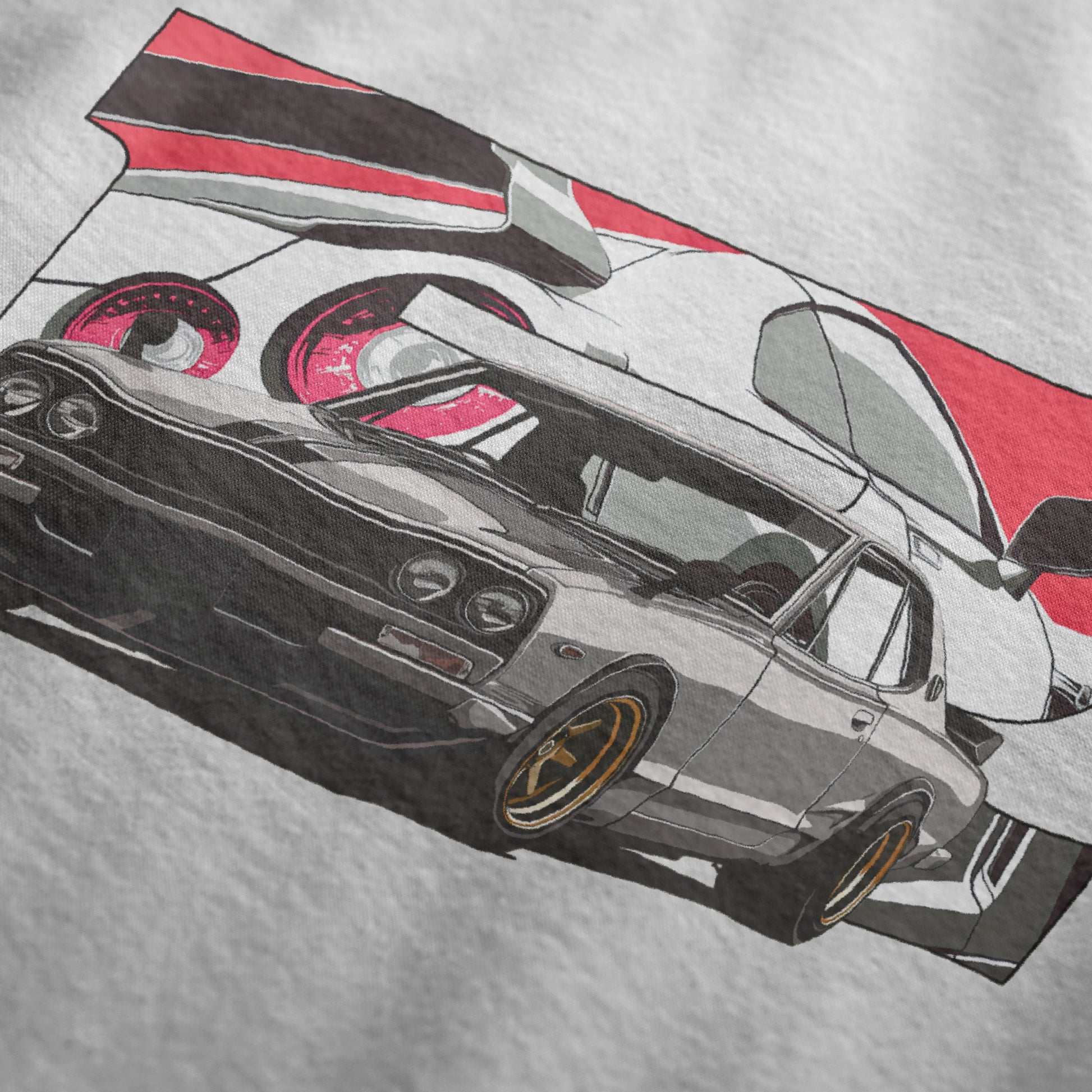 Close up of 1970 2000GT-R Fuji Speedway Heritage Automotive Graphic T-Shirt – White unisex tee featuring a classic 1970 2000GT-R in front of a stylized Fuji Speedway background in red and white. Ideal gift for vintage car enthusiasts and JDM lovers.
