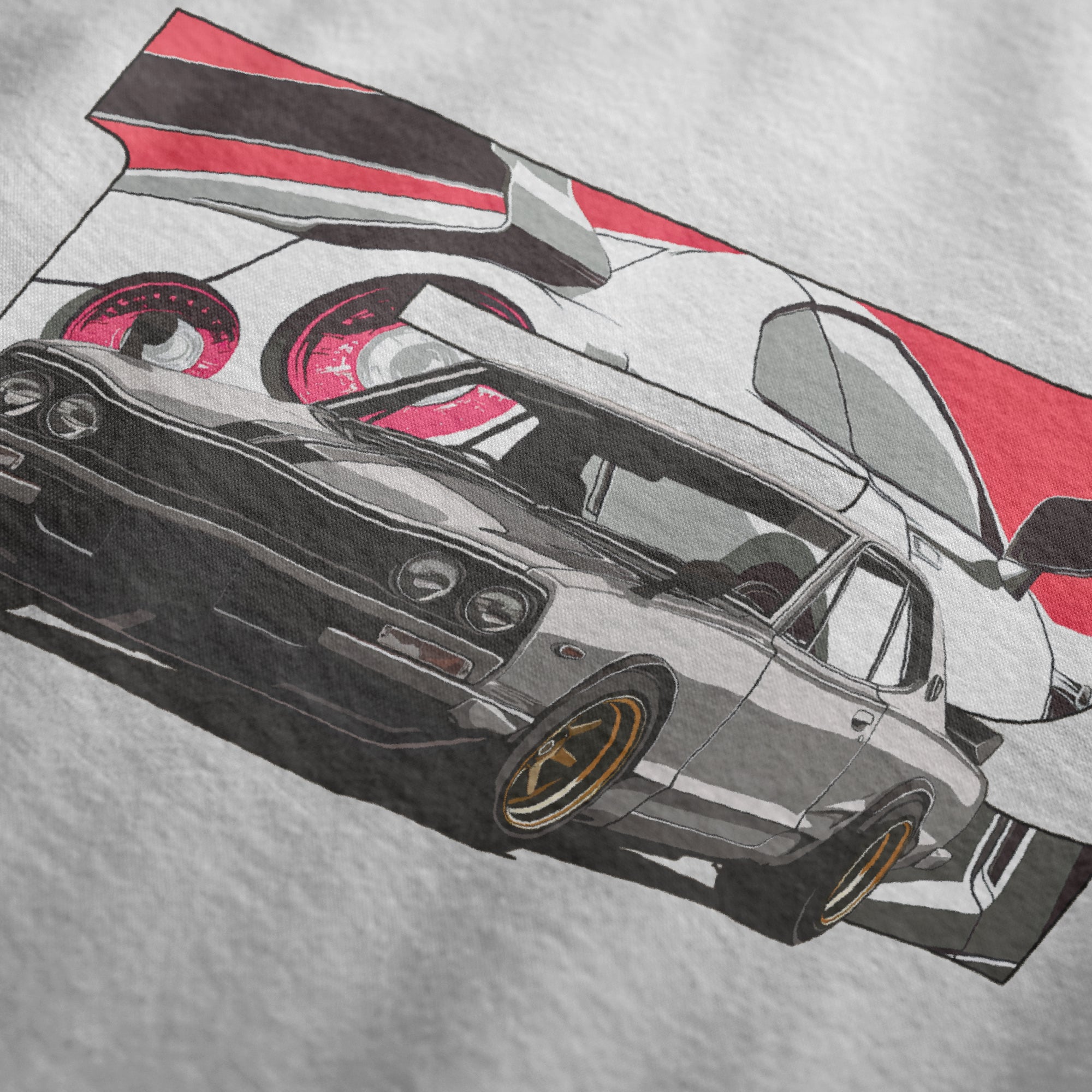 Close up of 1970 2000GT-R Fuji Speedway Heritage Automotive Graphic T-Shirt – White unisex tee featuring a classic 1970 2000GT-R in front of a stylized Fuji Speedway background in red and white. Ideal gift for vintage car enthusiasts and JDM lovers.