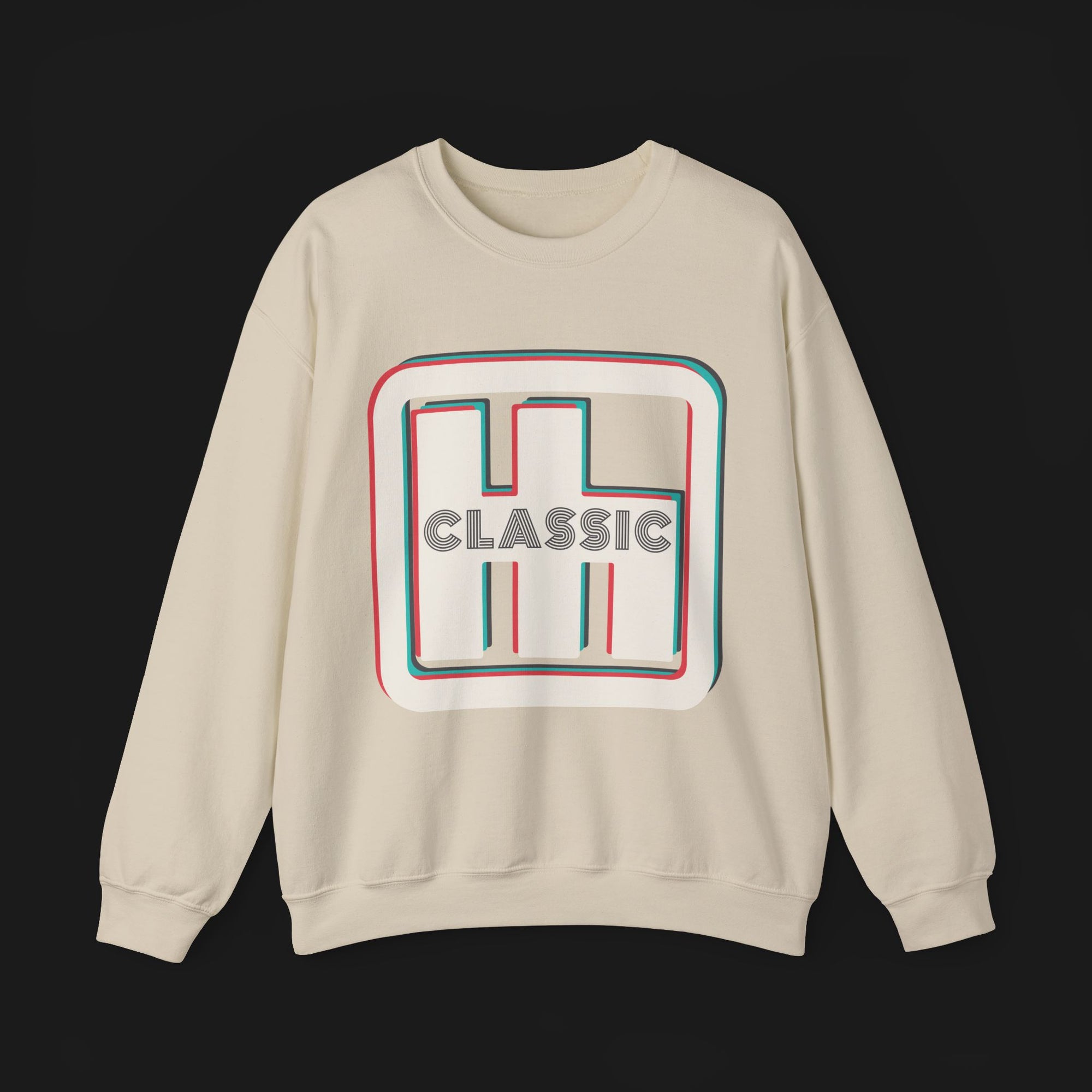 Front of Clutch Classic Automotive Graphic Crewneck – Beige unisex crewneck sweater featuring a retro 'Clutch' logo with a bold outlined design in red, blue, and white. Perfect for car enthusiasts and casual wear.