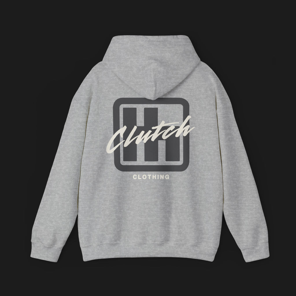 Clutch Clothing Unisex Automotive Graphic Hoodie – Sport Grey hoodie featuring a bold 'Clutch' logo with a stylized 'H' shifter design and script text overlay. Ideal for car enthusiasts and casual streetwear."