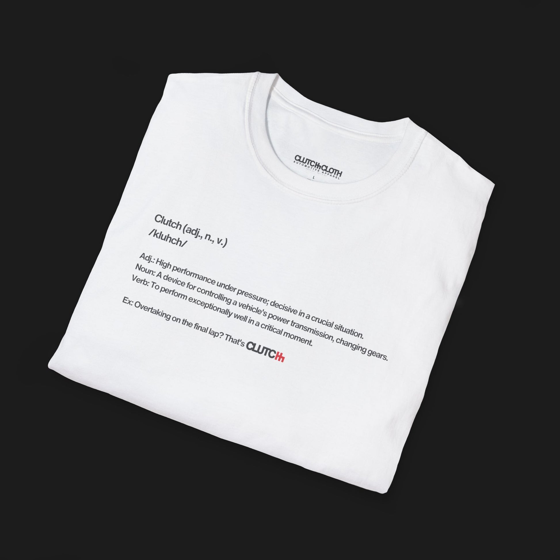 Folded Define Clutch Automotive Graphic T-Shirt – White unisex tee featuring the definition of 'Clutch' in a minimalist text design. A perfect gift for car enthusiasts and motorsport fans.