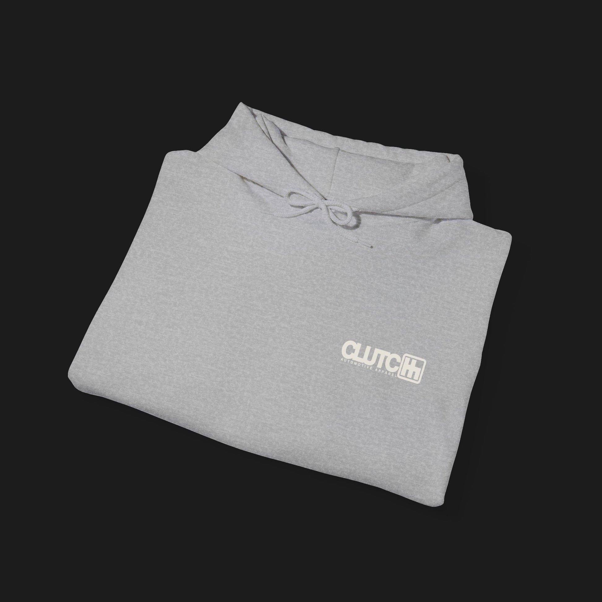 Folded Front Clutch Clothing Unisex Automotive Graphic Hoodie – Sport Grey hoodie featuring a bold 'Clutch' logo with a stylized 'H' shifter design and script text overlay. Ideal for car enthusiasts and casual streetwear."