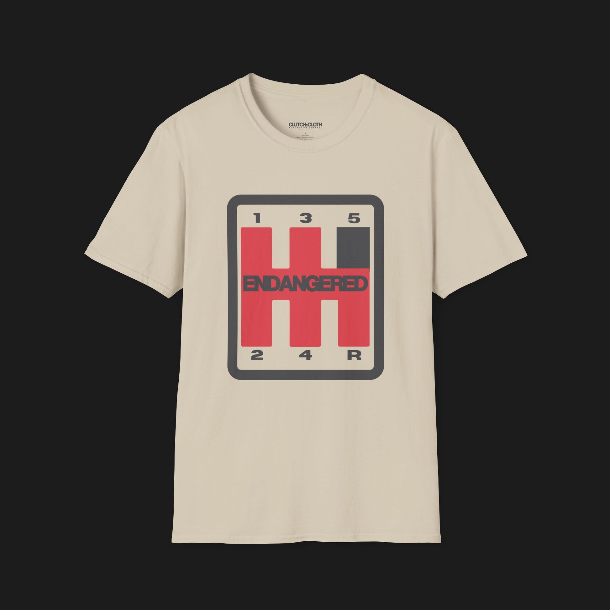 Front angle of Endangered Species Shifter Automotive Graphic T-Shirt – Sand unisex tee featuring a bold manual gear shift design with 'Endangered' text. A perfect gift for stick shift enthusiasts and car lovers.