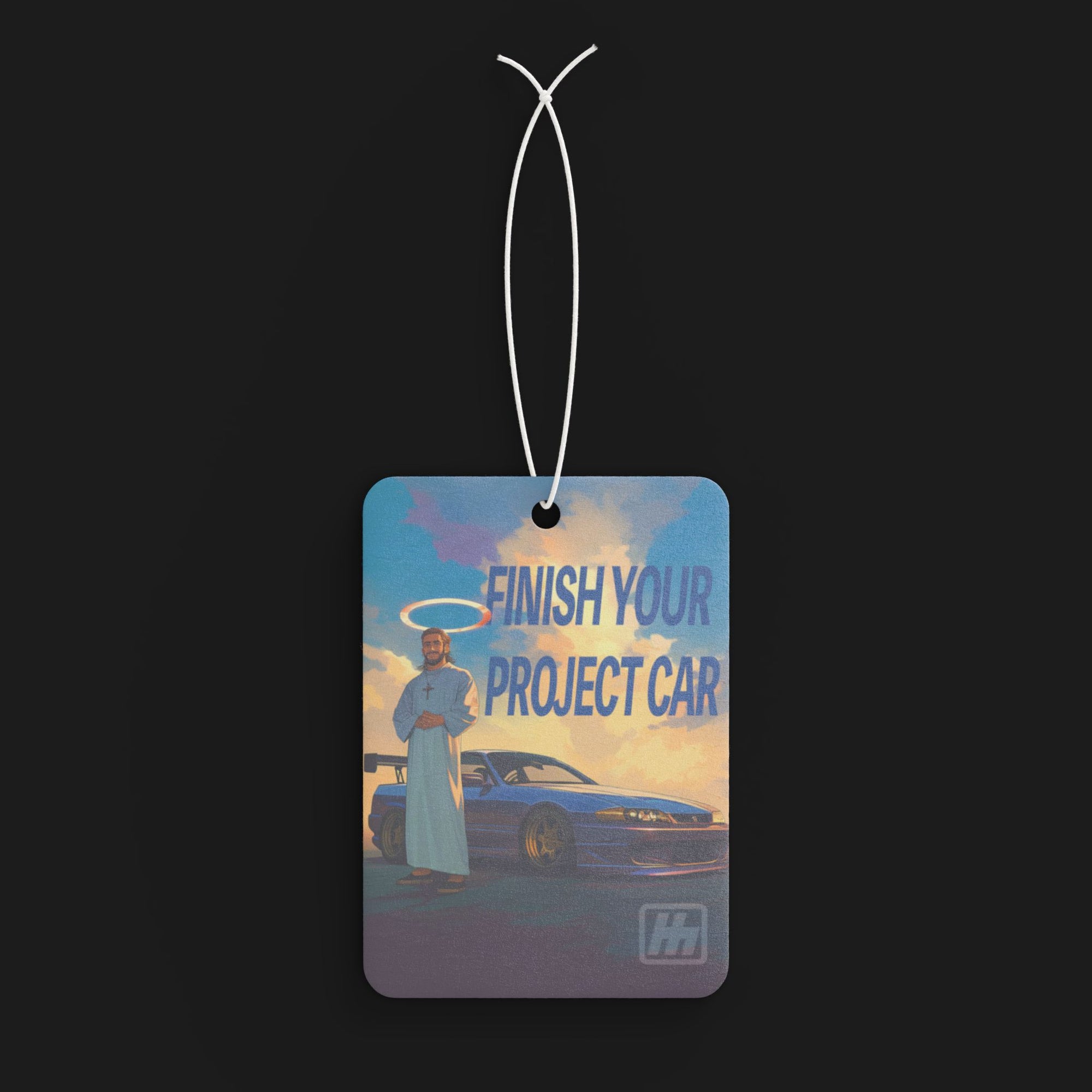 Premium car air freshener featuring a motivational "Finish Your Project Car" design. Perfect for car enthusiasts looking to keep their ride smelling fresh and stylish.