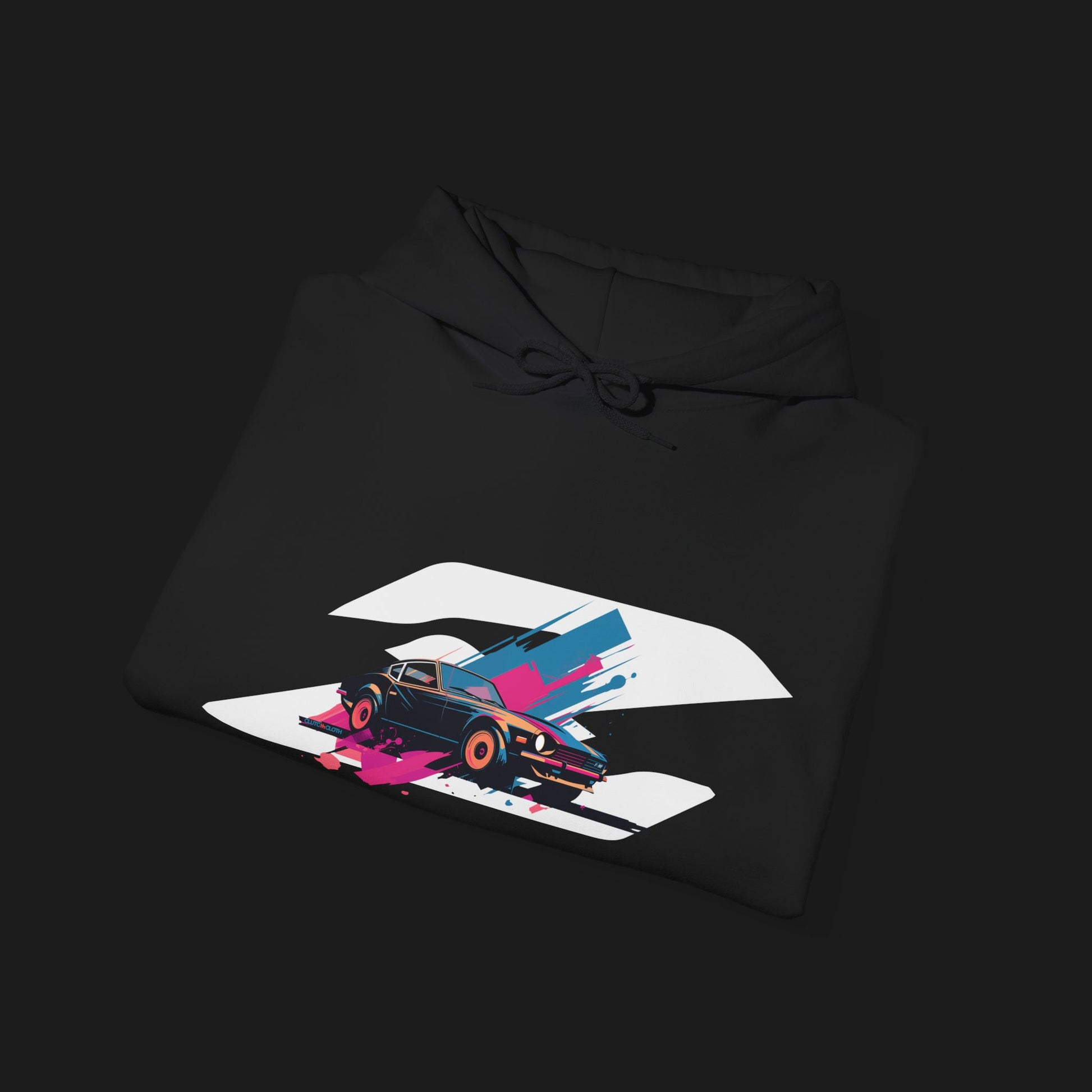 Folded front Retro 280Z Automotive Graphic Hoodie – Black unisex hoodie featuring a colorful retro design of a Nissan 280Z with vibrant pink, blue, and gray geometric background. Ideal for classic JDM and car lovers.