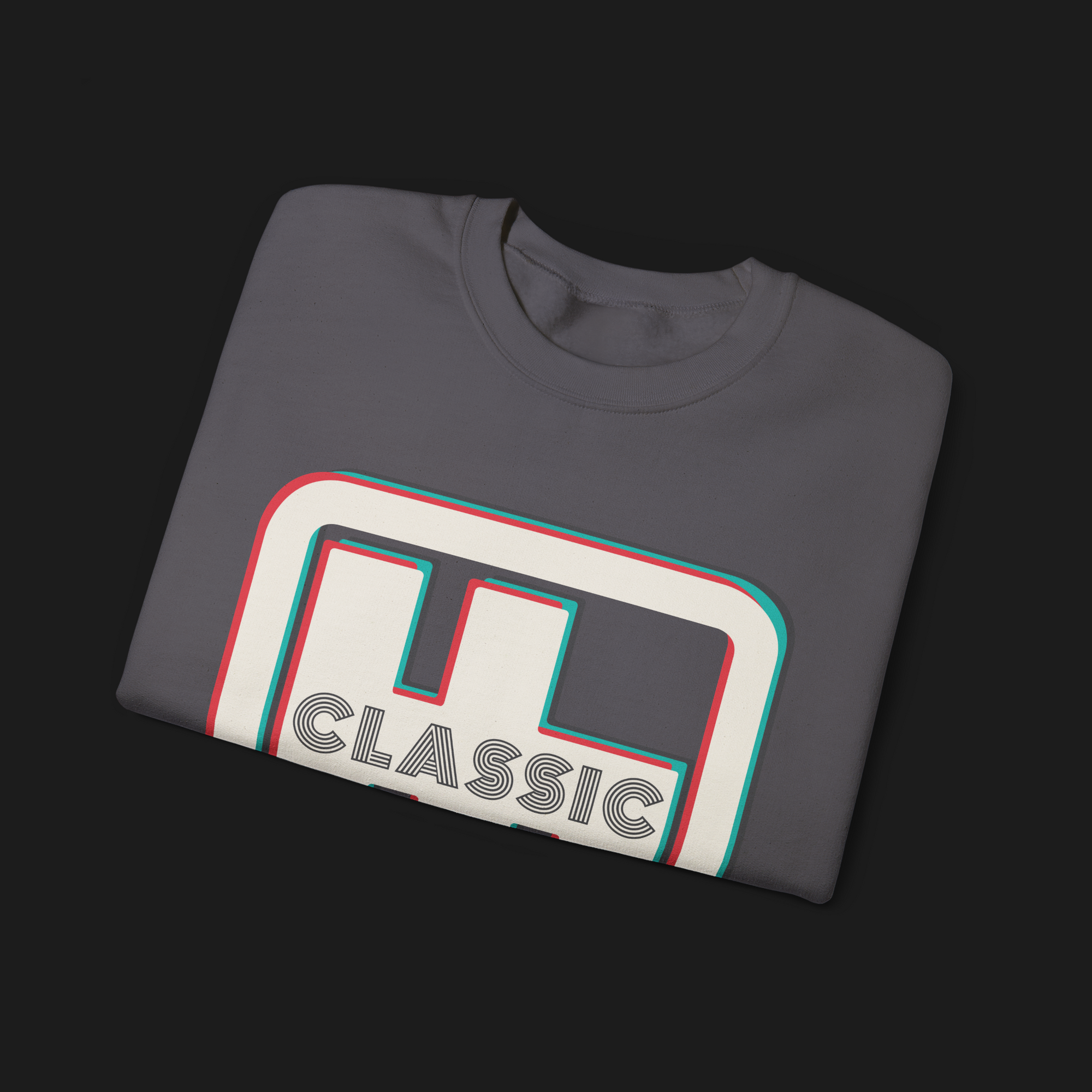 Folded Clutch Classic Automotive Graphic Crewneck – Grey unisex crewneck sweater featuring a retro 'Clutch' logo with a bold outlined design in red, blue, and white. Perfect for car enthusiasts and casual wear.