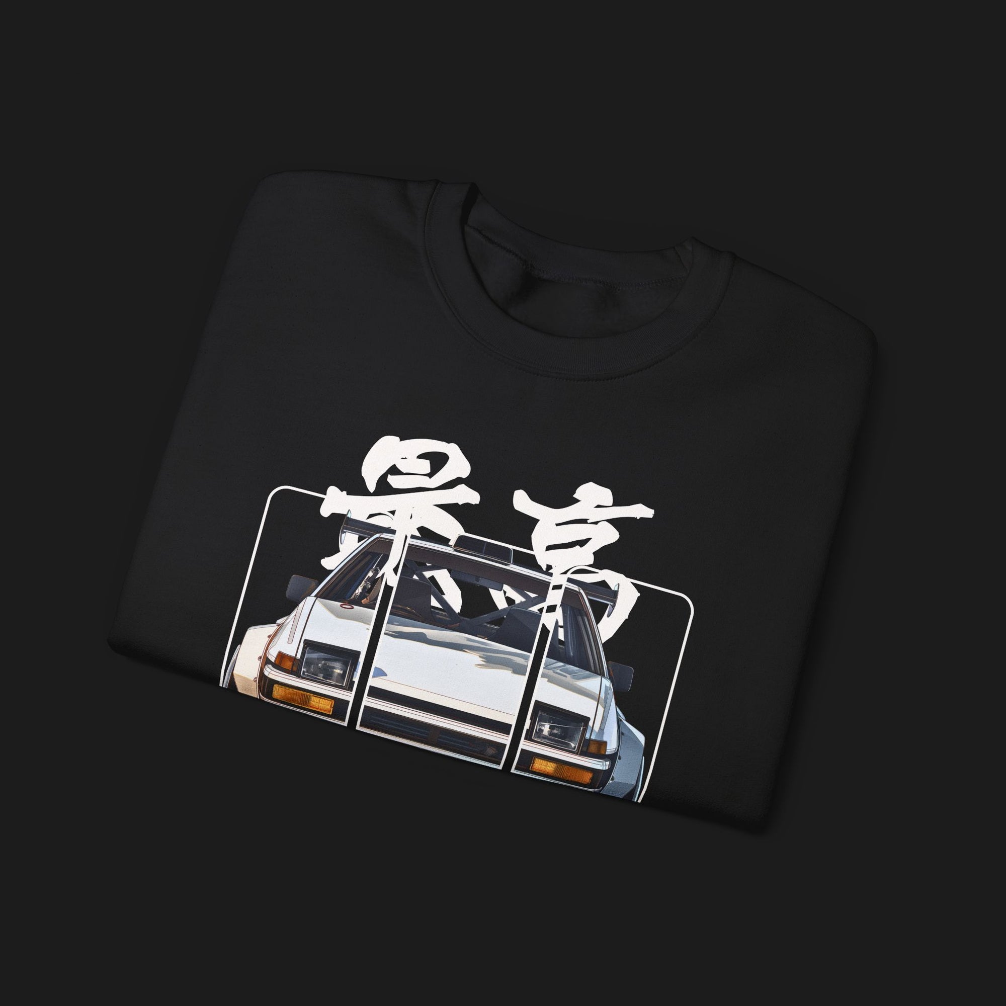 Folded AE86 Automotive Graphic Crewneck – Black unisex crewneck sweater featuring a front graphic of a white AE86 car with red Japanese text background design. Perfect for JDM enthusiasts and car lovers.