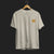 Front Angle of Astonishingly Overkill Automotive Graphic T-Shirt – Beige tee featuring a bold Audi Quattro rally car design with a yellow overlay and "Astonishingly Overkill" text. Perfect gift for rally fans and car enthusiasts.