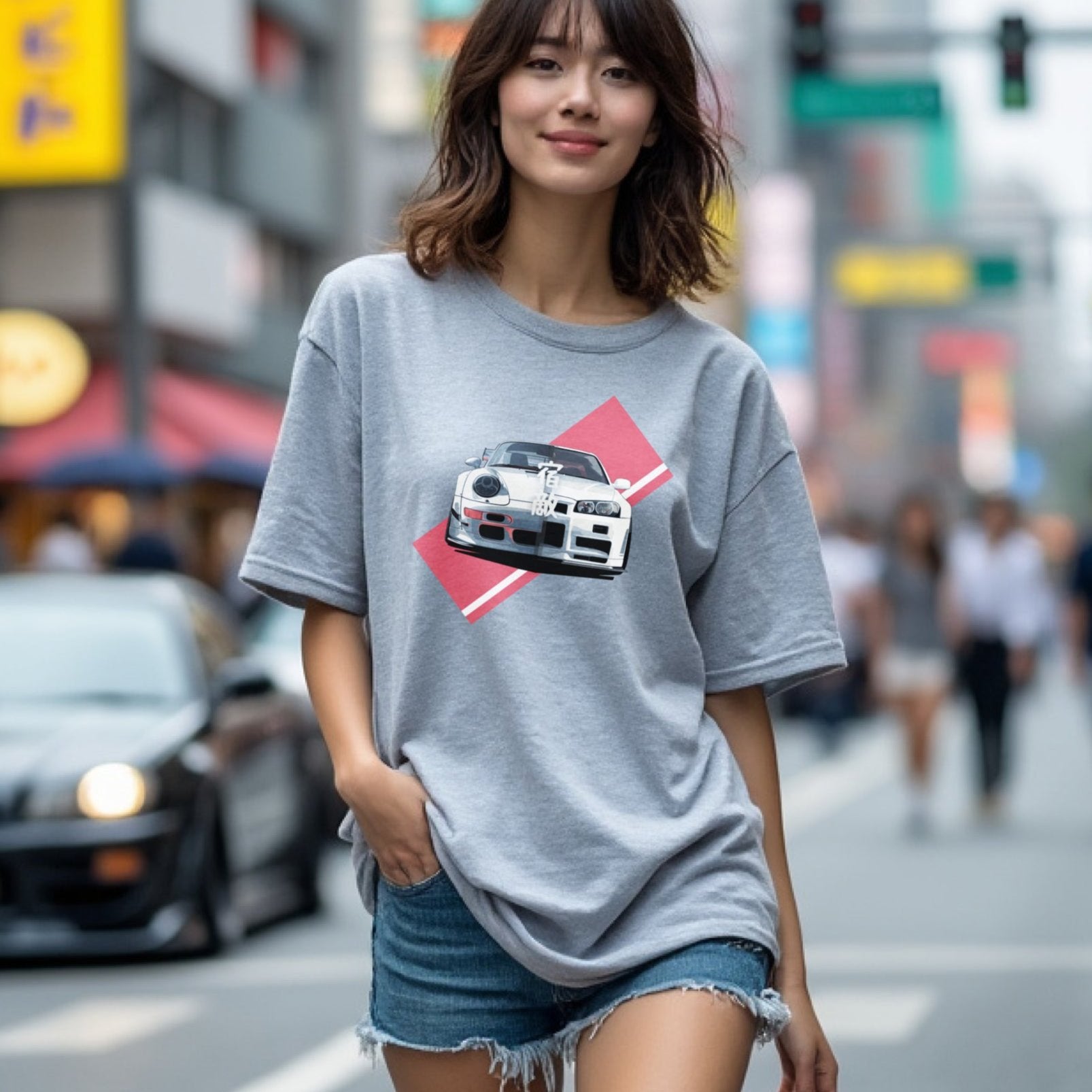 Woman wearing 911 GT-R Nemesis, Forever Rivals Automotive Graphic T-Shirt – Charcoal unisex tee featuring a front-facing Porsche 911 and GT-R graphic with a red geometric background. Perfect gift for car enthusiasts and JDM fans.