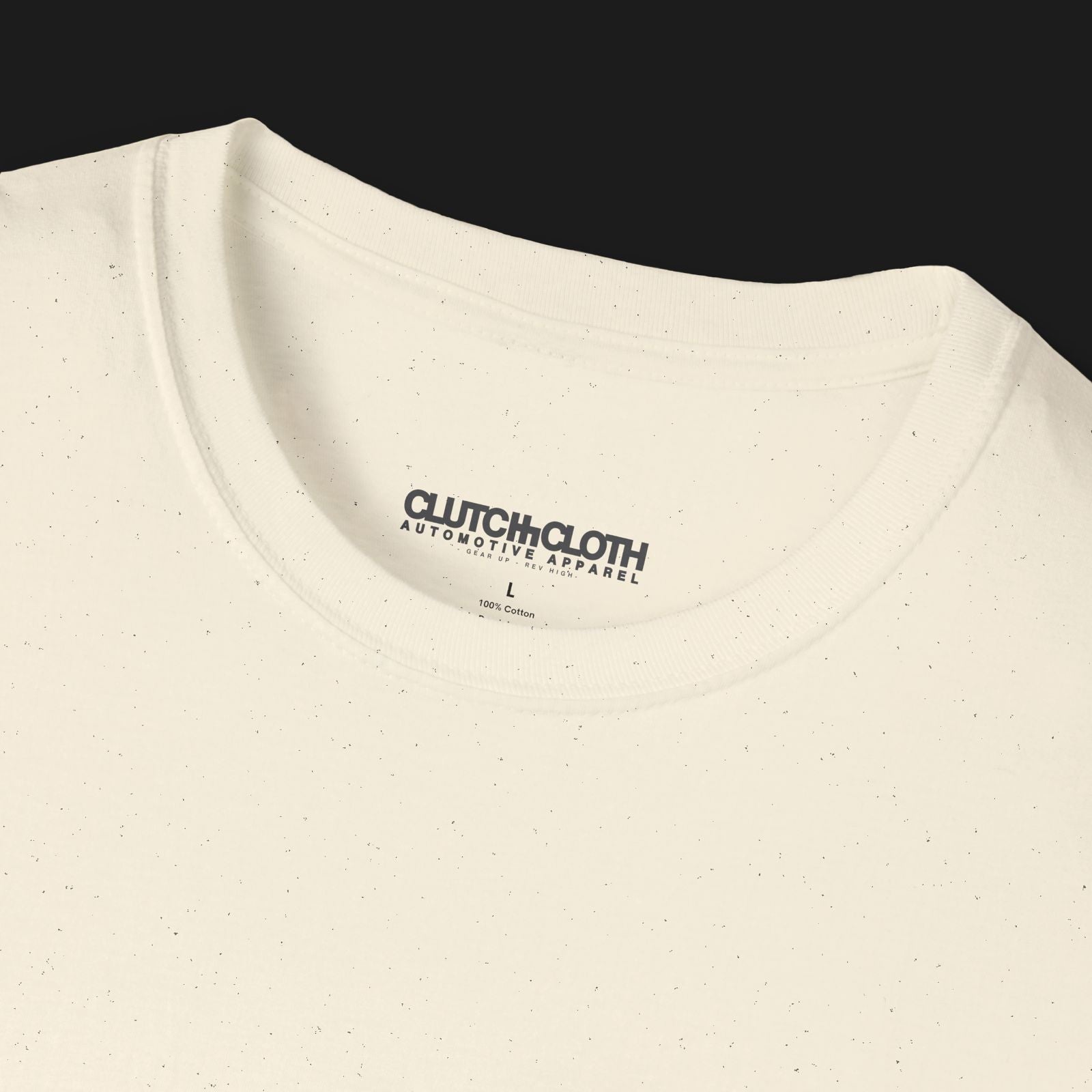 Astonishingly Overkill Automotive Graphic T-Shirt Collar – Beige tee featuring a bold Audi Quattro rally car design with a yellow overlay and "Astonishingly Overkill" text. Perfect gift for rally fans and car enthusiasts.