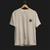 Brutally Unapologetic 30CSL Automotive Graphic T-Shirt – Front of White tee featuring a detailed front design of the iconic BMW 30CSL with red, blue, and white racing stripes. Perfect gift for BMW fans and car enthusiasts.