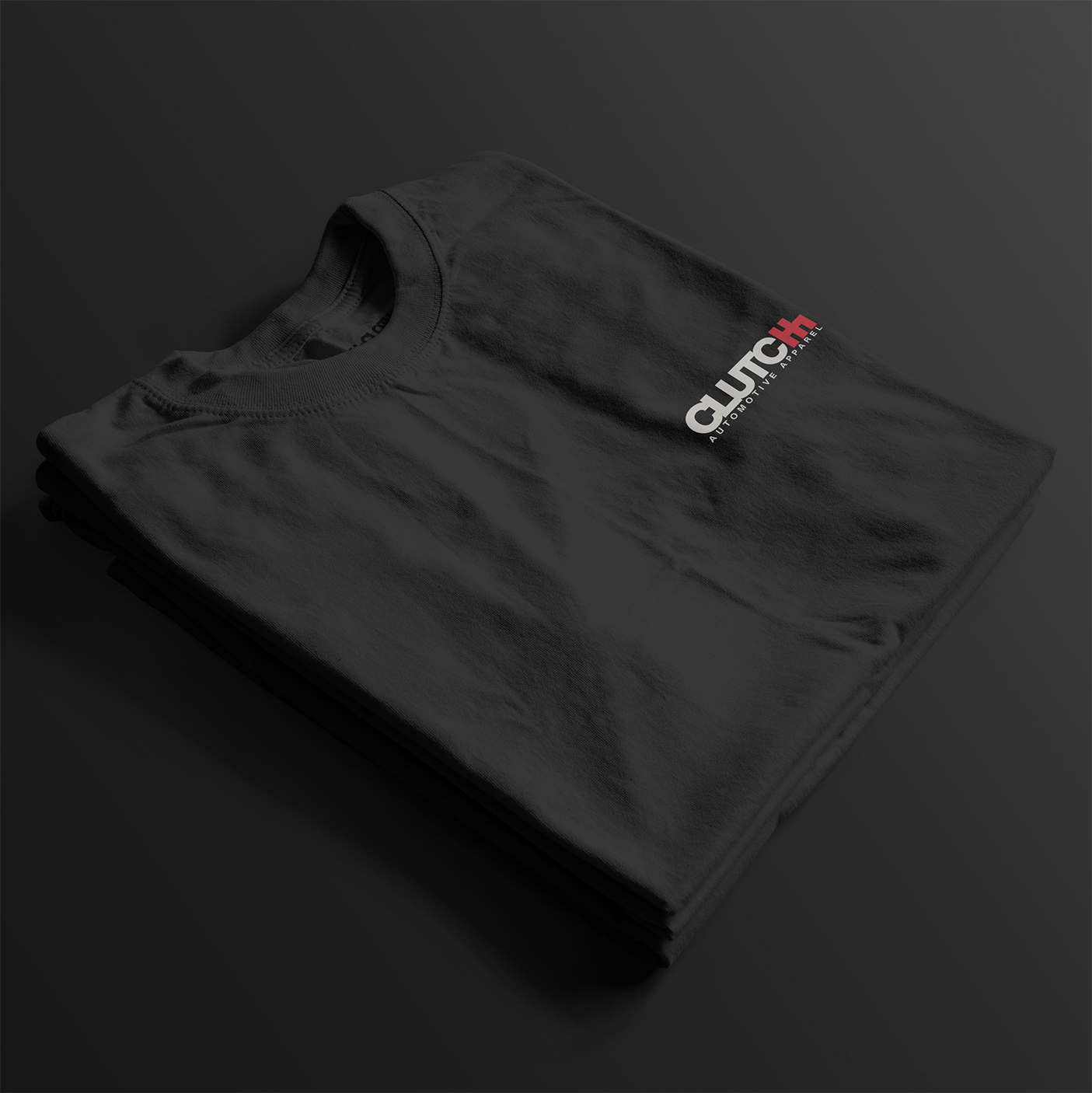Folded Cobro x Clutch Automotive Graphic T-Shirt – Black tee featuring a detailed white Mustang Cobra design with graffiti-style background and "Cobro" text. Perfect gift for Mustang fans and car enthusiasts.