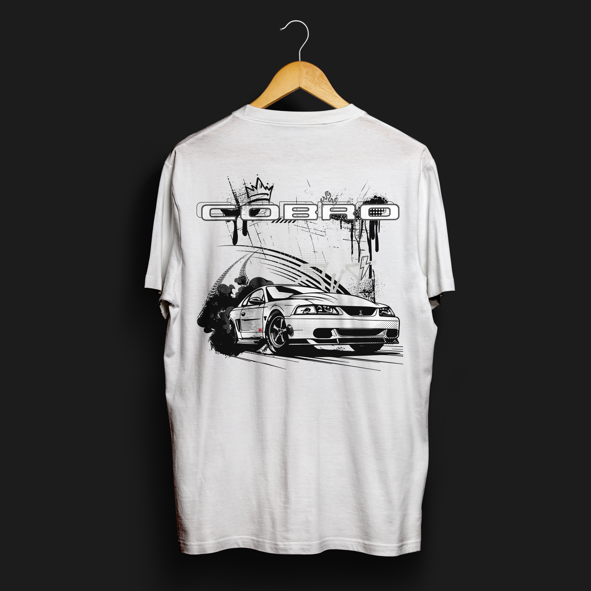 back angle of Cobro x Clutch Automotive Graphic T-Shirt – White tee featuring a detailed white Mustang Cobra design with graffiti-style background and "Cobro" text. Perfect gift for Mustang fans and car enthusiasts.