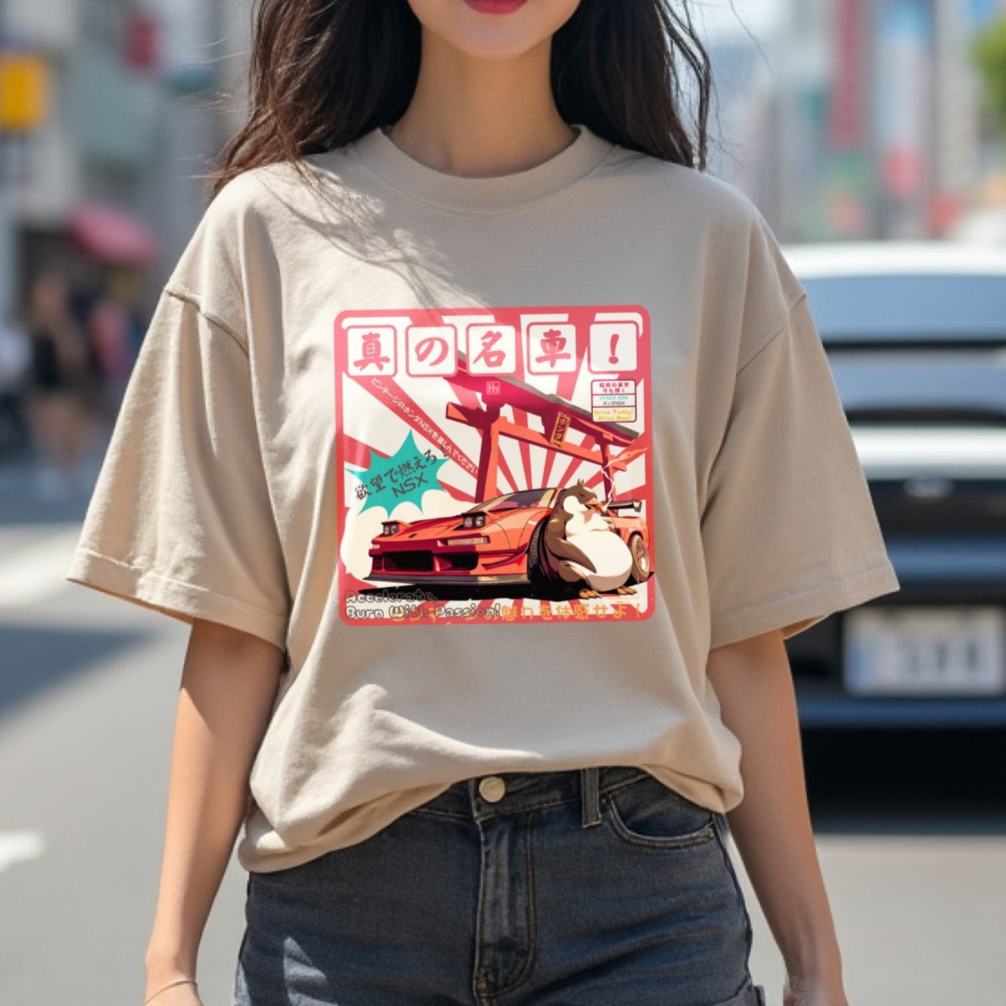 Woman wearing NSX Travel Penguin Automotive Graphic T-Shirt – Sand tee featuring an NSX sports car with Japanese travel-inspired artwork and a penguin character. Perfect gift for JDM fans and car enthusiasts.