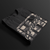 Clutch Clothing Camo Automotive Graphic T-Shirt – Folded view of black camo-patterned Clutch Clothing graphic tee. Ideal for car enthusiasts and streetwear lovers.