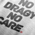Close up design angle for No Dragy No Care Automotive Graphic T-Shirt – tee with bold "No Dragy No Care" text design in black. Ideal gift for car culture fans and automotive enthusiasts.