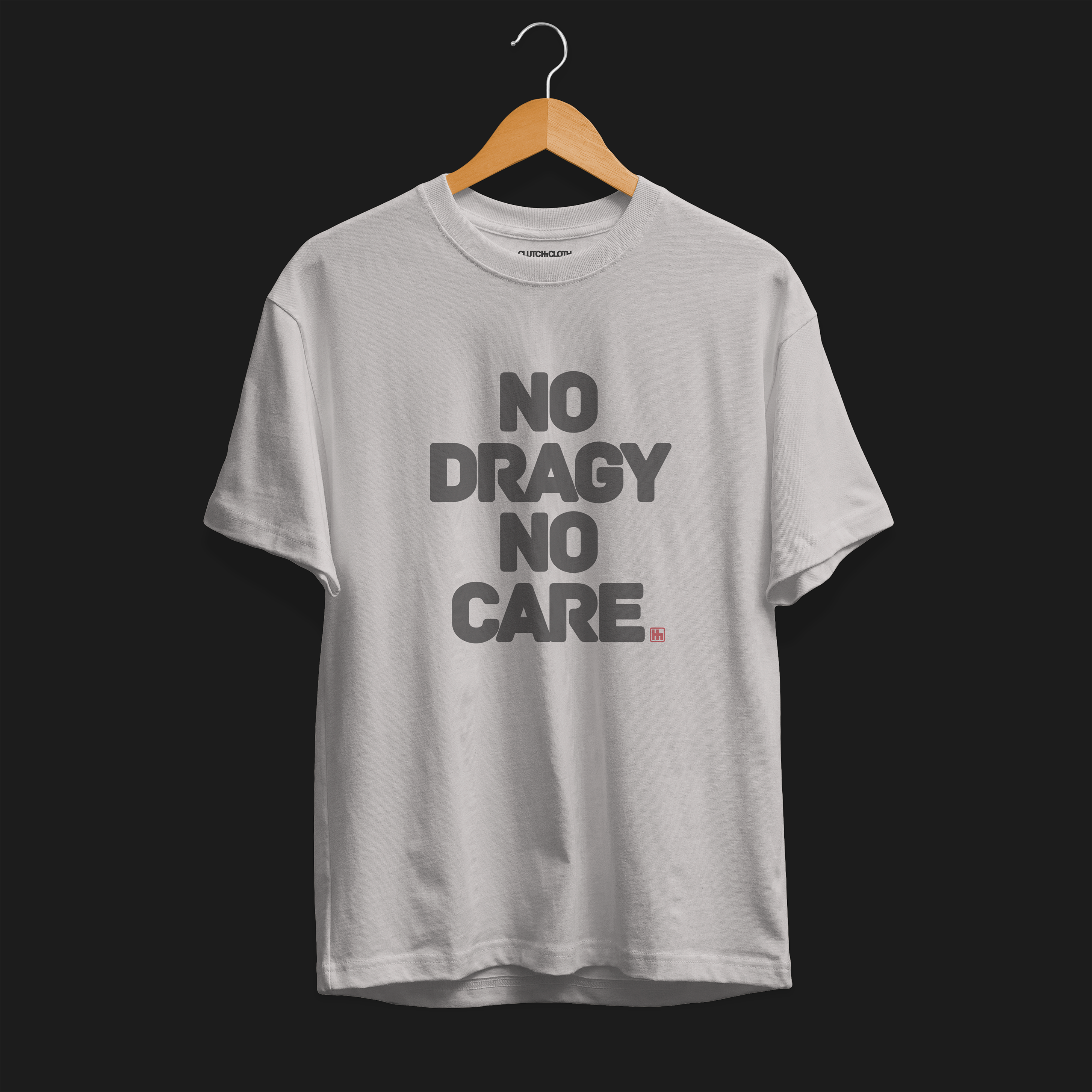 Front Angle of No Dragy No Care Automotive Graphic T-Shirt – Ice Grey tee with bold "No Dragy No Care" text design in black. Ideal gift for car culture fans and automotive enthusiasts.