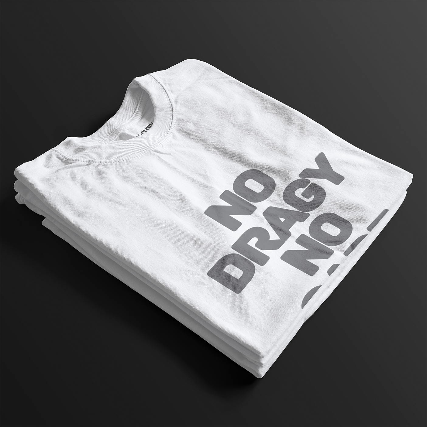 Folded No Dragy No Care Automotive Graphic T-Shirt – White tee with bold "No Dragy No Care" text design in black. Ideal gift for car culture fans and automotive enthusiasts.