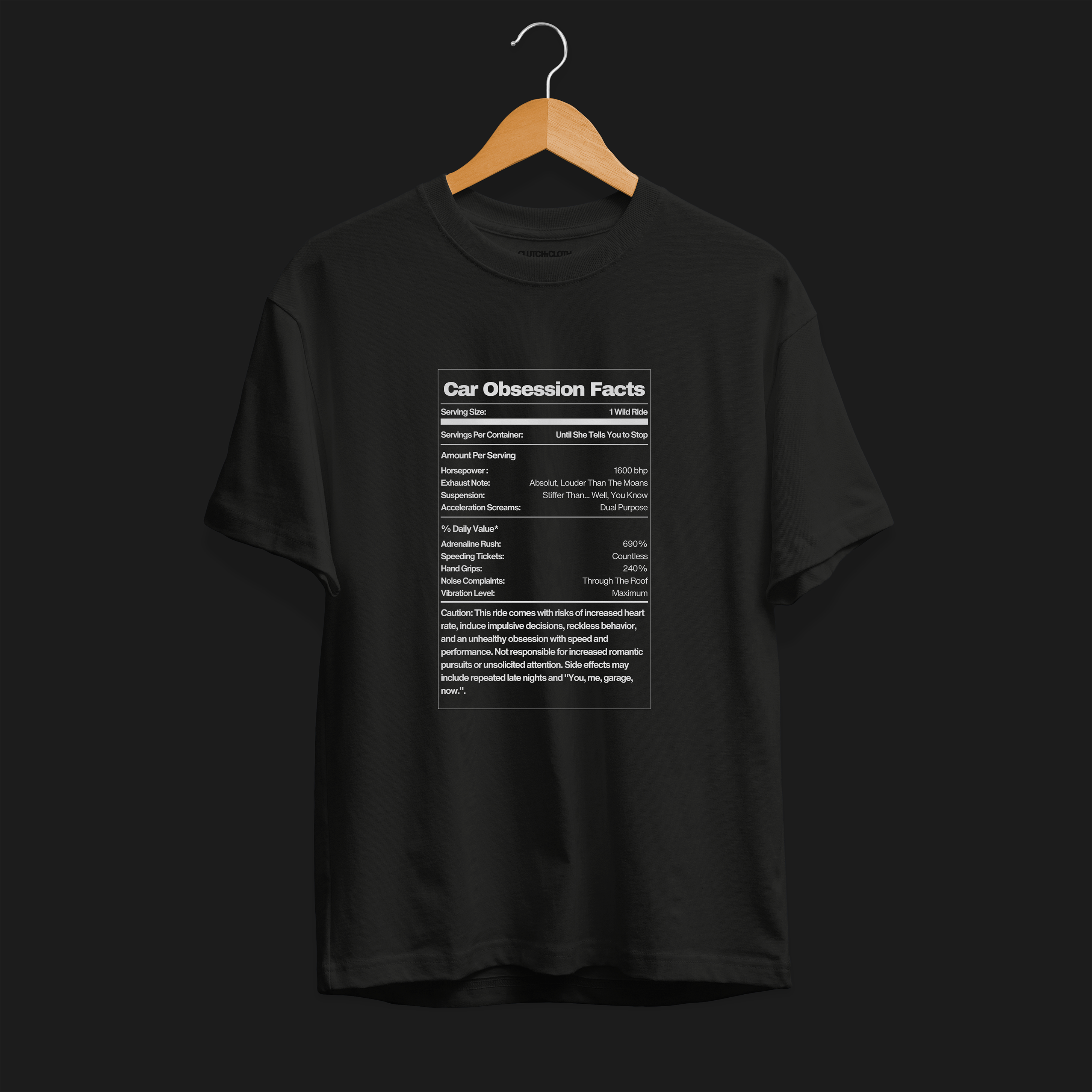 Close up of Car Obsession Facts Automotive Graphic T-Shirt – Black unisex tee featuring a humorous 'Car Obsession Facts' label with details on horsepower, speed, and side effects. Ideal gift for car lovers and automotive enthusiasts.