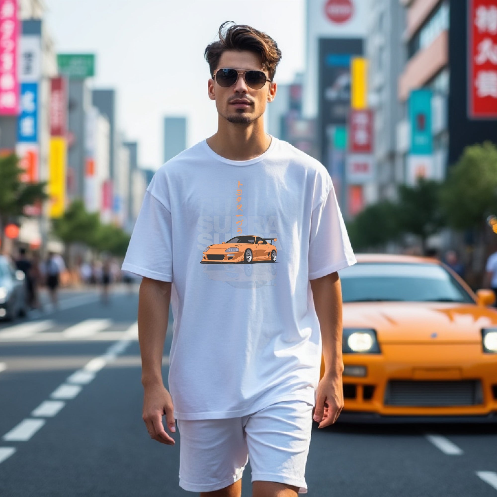 Man wearing FF Supra Buster Automotive Graphic T-Shirt – White unisex tee featuring an orange Toyota Supra with Japanese text and a grey 'SUPRA' background. Ideal gift for JDM fans and car enthusiasts.