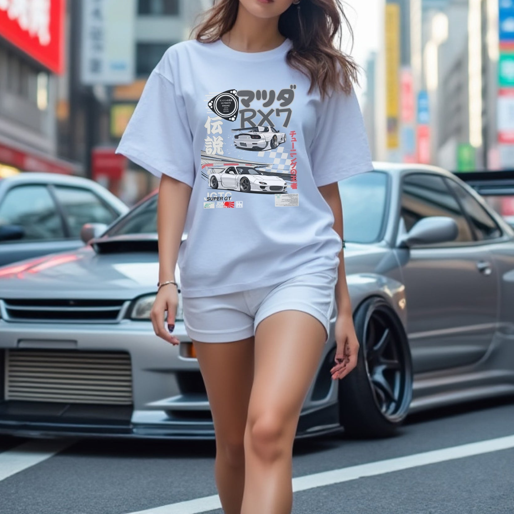 Woman wearing Legendary Suzuka RX7 Automotive Graphic T-Shirt – Blue tee featuring detailed RX7 graphics with Japanese lettering and racing elements. Perfect gift for JDM and car culture enthusiasts.