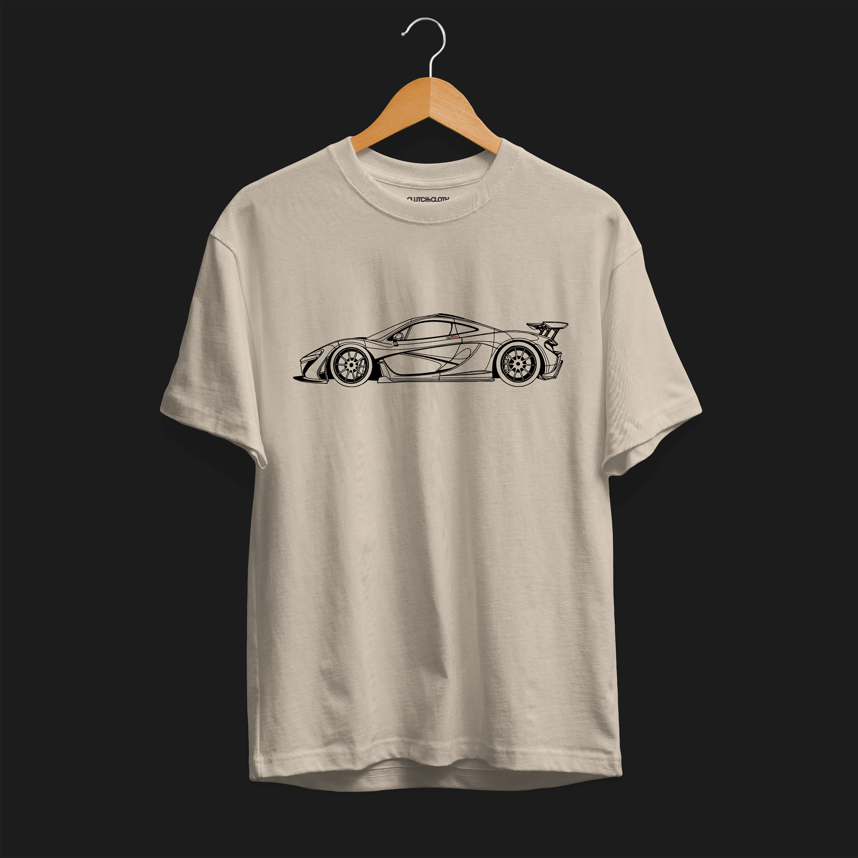 Front angle of P1 GTR Automotive Graphic T-Shirt –  beige unisex tee featuring a minimalist line art illustration of the P1 GTR supercar. A perfect gift for car enthusiasts and motorsport fans.