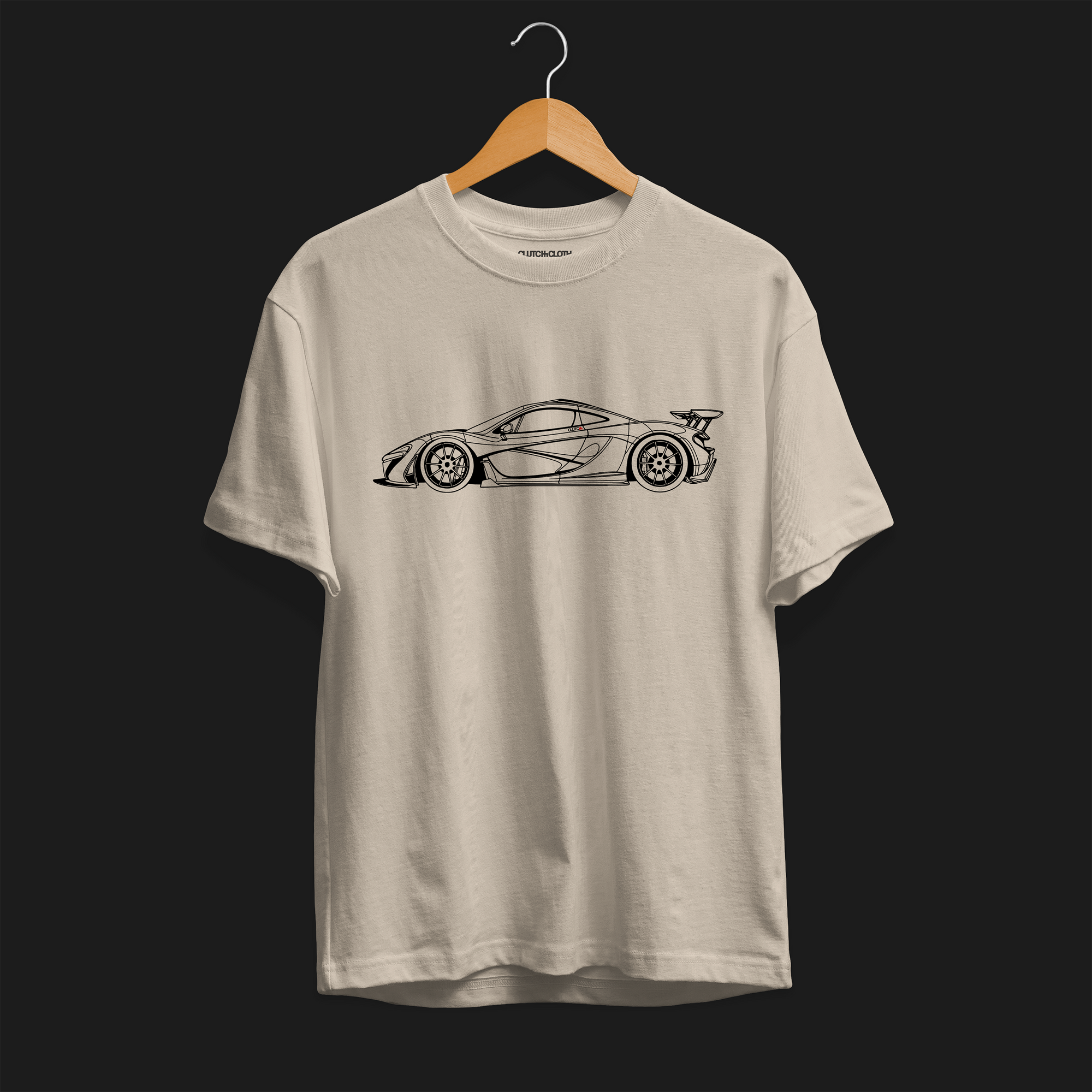 Front angle of P1 GTR Automotive Graphic T-Shirt –  beige unisex tee featuring a minimalist line art illustration of the P1 GTR supercar. A perfect gift for car enthusiasts and motorsport fans.