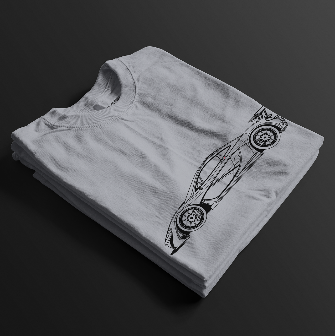 Folded P1 GTR Automotive Graphic T-Shirt – Grey unisex tee featuring a minimalist line art illustration of the P1 GTR supercar. A perfect gift for car enthusiasts and motorsport fans.