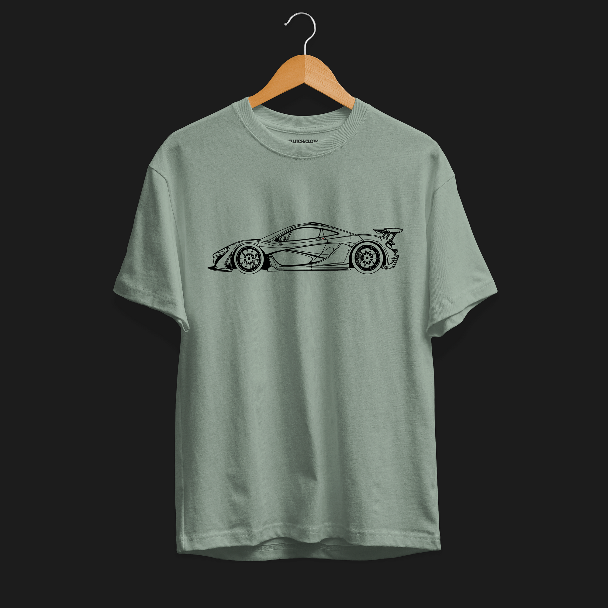 Front angle of P1 GTR Automotive Graphic T-Shirt – Sage green unisex tee featuring a minimalist line art illustration of the P1 GTR supercar. A perfect gift for car enthusiasts and motorsport fans.