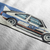 Close up of CW Rally 83 Automotive Graphic T-Shirt Design – White unisex tee with a minimalist rally car graphic and blue and grey racing stripes. Perfect gift for rally enthusiasts and motorsport lovers.