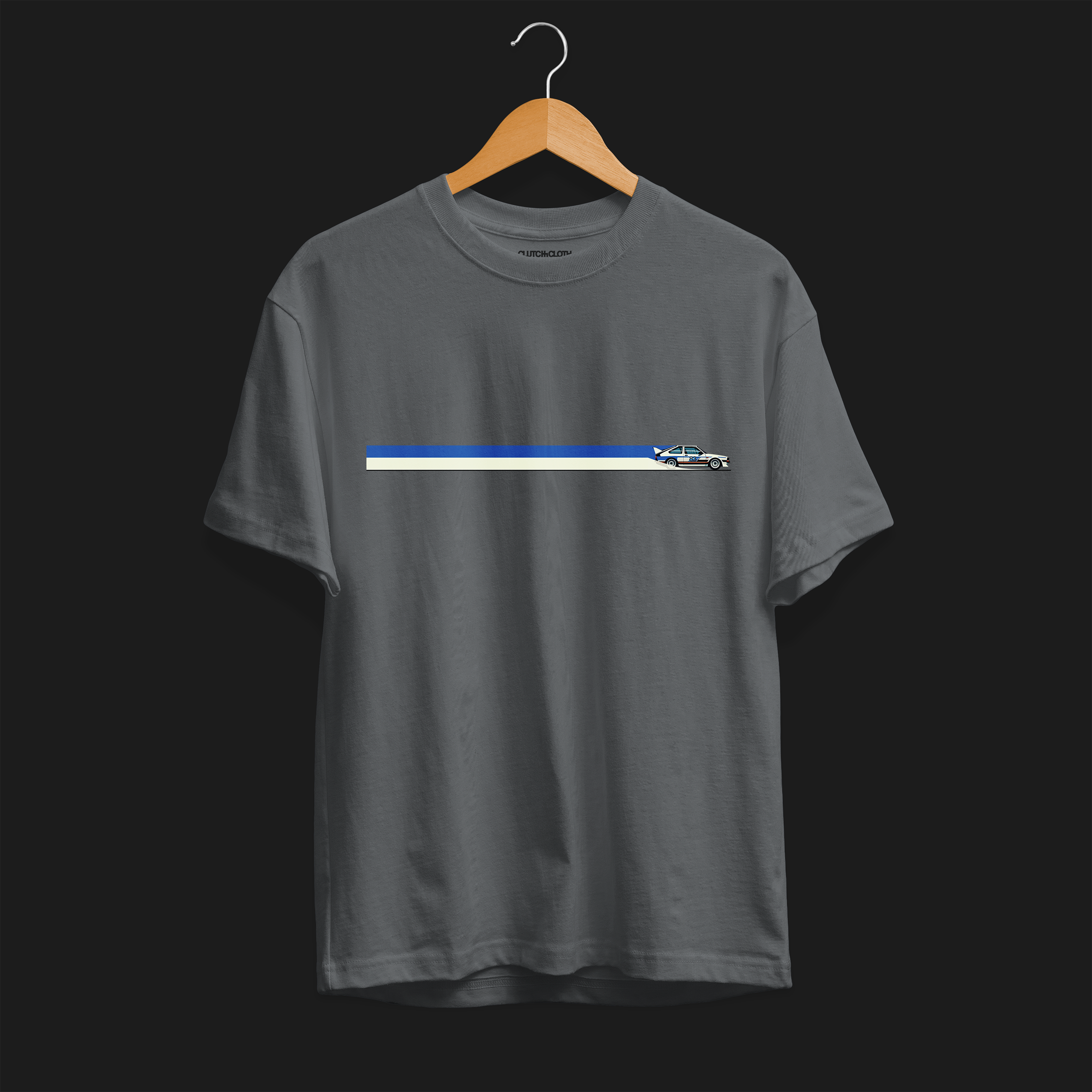 Front of CW Rally 83 Automotive Graphic T-Shirt – Charcoal unisex tee with a minimalist rally car graphic and blue and grey racing stripes. Perfect gift for rally enthusiasts and motorsport lovers.