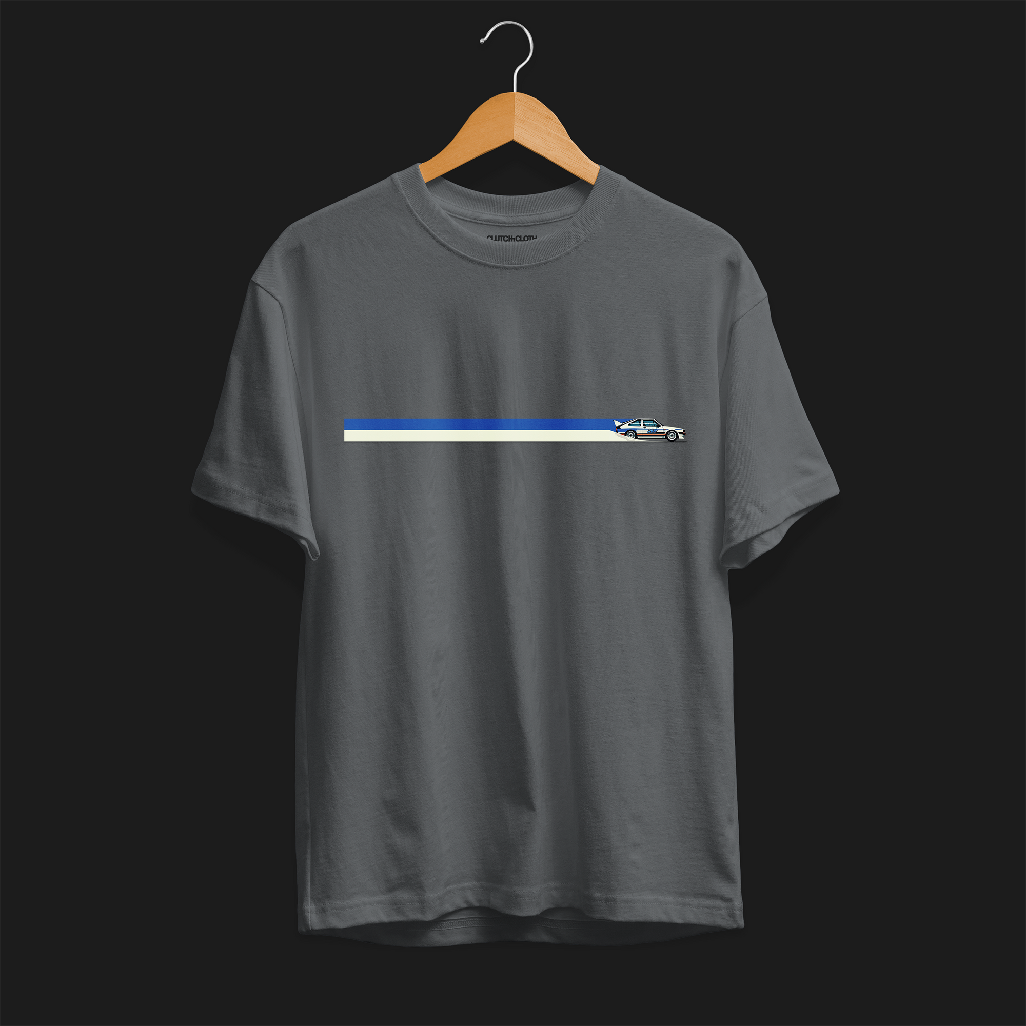 Front of CW Rally 83 Automotive Graphic T-Shirt – Charcoal unisex tee with a minimalist rally car graphic and blue and grey racing stripes. Perfect gift for rally enthusiasts and motorsport lovers.