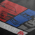 Close up of RS2 Heritage Automotive Graphic T-Shirt Design – Black unisex tee featuring a stylish RS2 car design with red, white, and blue color blocks. Ideal gift for classic car enthusiasts and Audi fans.