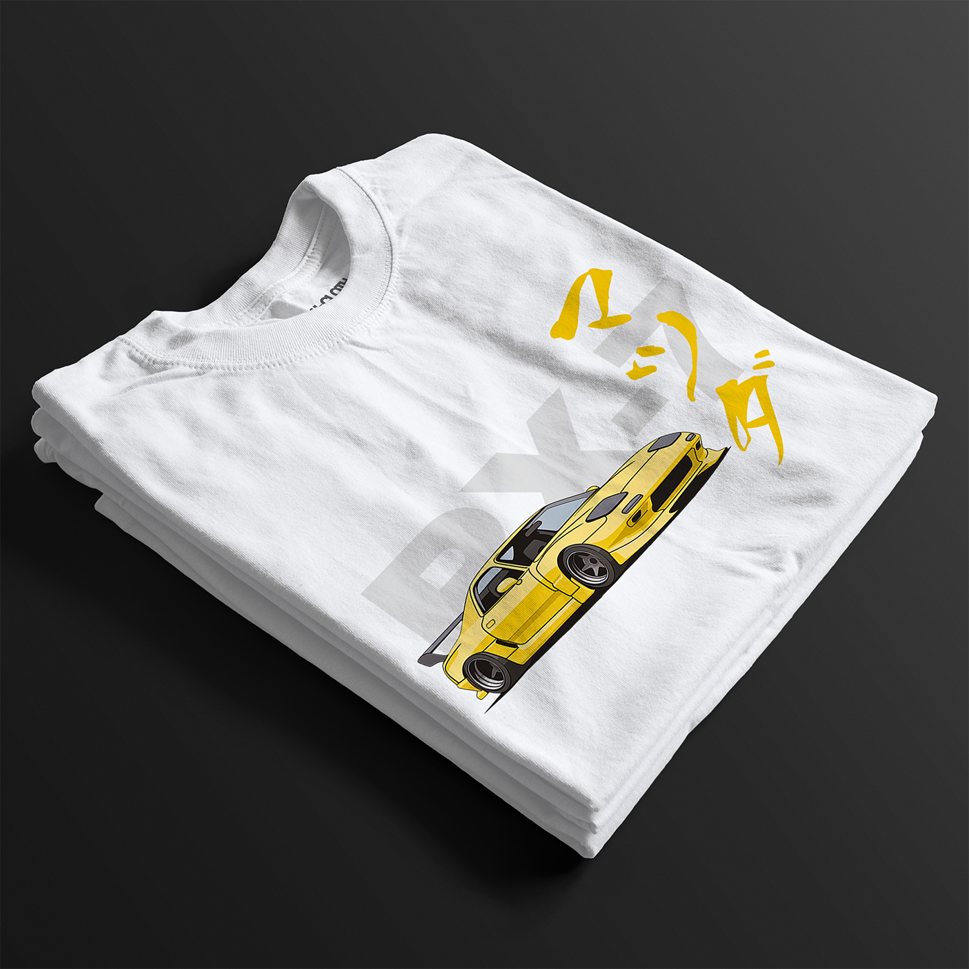 Folded white RX-7 Rotary Legend Automotive Graphic T-Shirt featuring a yellow Mazda RX-7 with Japanese text and RX-7 lettering, unisex car enthusiast gift