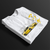 Folded white RX-7 Rotary Legend Automotive Graphic T-Shirt featuring a yellow Mazda RX-7 with Japanese text and RX-7 lettering, unisex car enthusiast gift
