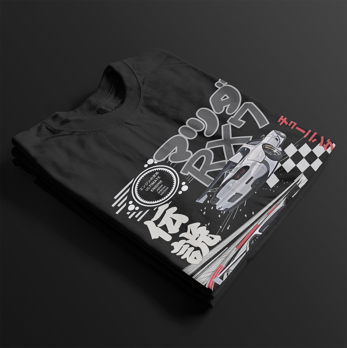 Folded Legendary Suzuka RX7 Automotive Graphic T-Shirt – Black tee featuring detailed RX7 graphics with Japanese lettering and racing elements. Perfect gift for JDM and car culture enthusiasts.