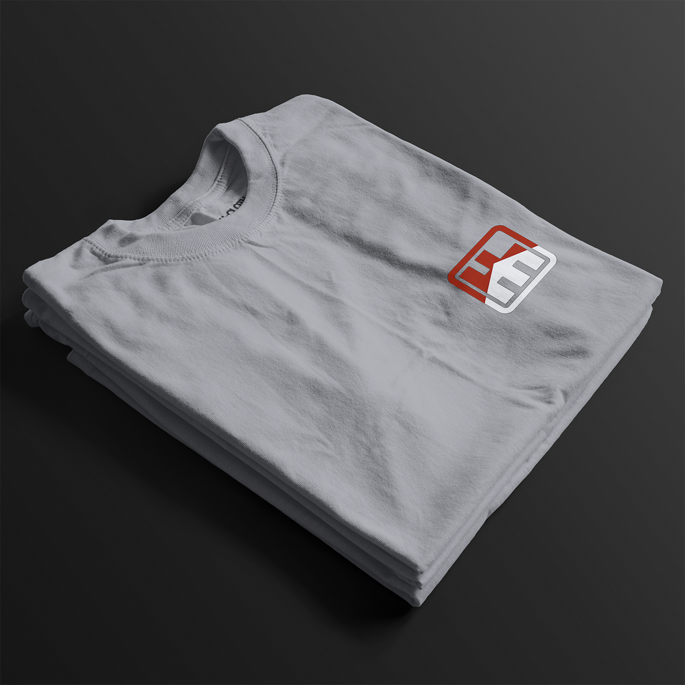 Senna - Give Everything Automotive Graphic T-Shirt – folded sport grey tee featuring an iconic Ayrton Senna McLaren design with bold red and black text. Perfect for F1 fans and motorsport enthusiasts.