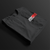 Folded Black JDM Rising Sun Automotive Graphic T-Shirt with JDM text and a red rising sun graphic, unisex car culture gift