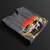 Folded Racing Sport Rally Sunset Automotive Graphic T-Shirt – Charcoal unisex tee featuring a rally car and a vintage car against a bold sunset background in shades of red, orange, and yellow. Ideal gift for car and motorsport enthusiasts.