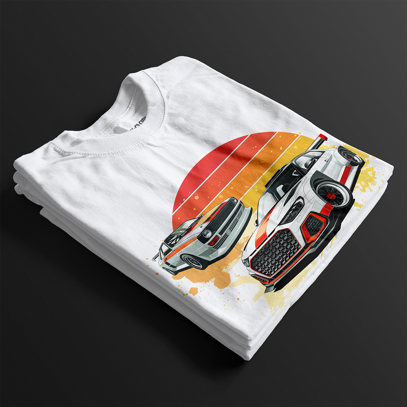 Folded Racing Sport Rally Sunset Automotive Graphic T-Shirt – White unisex tee featuring a rally car and a vintage car against a bold sunset background in shades of red, orange, and yellow. Ideal gift for car and motorsport enthusiasts.