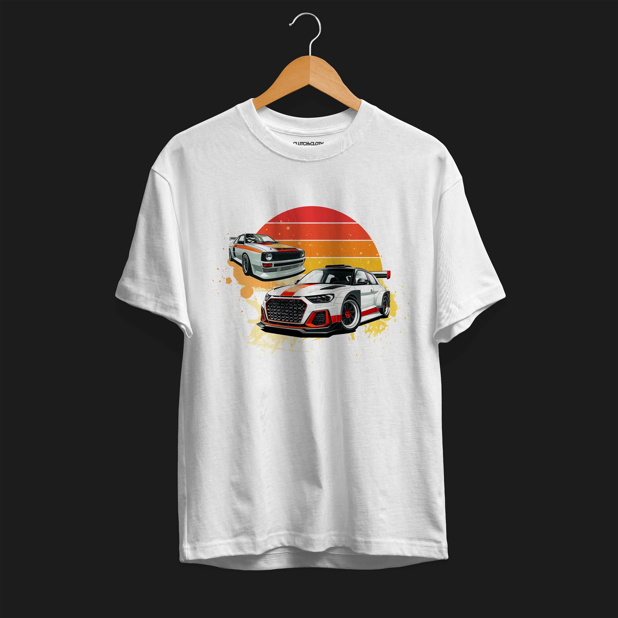 Front of Racing Sport Rally Sunset Automotive Graphic T-Shirt – White unisex tee featuring a rally car and a vintage car against a bold sunset background in shades of red, orange, and yellow. Ideal gift for car and motorsport enthusiasts.